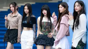 NewJeans Dons Distressed Miniskirts and Camo for Seoul Fashion Week