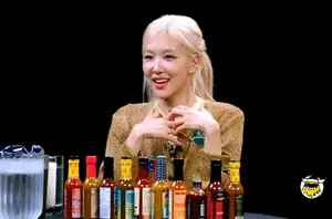 ROSÉ Delivers Tearful Last Words to Beloved Dog Hank While Struggling to ‘Survive’ on ‘Hot Ones’