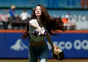 IVE's Jang Won-young throws first pitch at New York Mets game — in pictures
